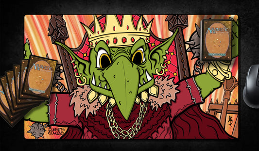 Hand-drawn playmat featuring a goblin king in royal red robes and a gold crown, brandishing twin spiked maces with a fiery background. Bold, cartoon-style art with vivid colors and intricate detail. Designed for Magic: The Gathering fans."

Let me know if you’d like a version that emphasizes SEO keywords like MTG artist playmats or goblin playmat. MTG artist playmats